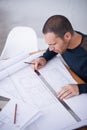 Man, architect and floor plan or building draft as blueprint design with ruler for property sketch, drawing or Royalty Free Stock Photo