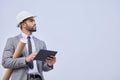 Man, architect and thinking with tablet on mockup in construction planning on a studio background. Person, engineer or