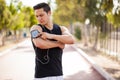 Man with an armband and earbuds Royalty Free Stock Photo