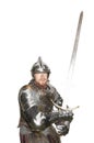 Man in armor with sword drawn Royalty Free Stock Photo