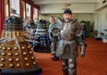 Man in armour with Daleks