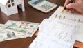 A man arranging receipts.