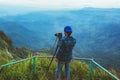 Man asians travel relax in the holiday. Photograph landscape on the Moutain.Thailand