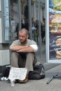 Man asking economical help on street Royalty Free Stock Photo