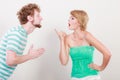 Man asking for forgivness. Conflicted couple. Royalty Free Stock Photo