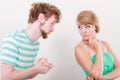 Man asking for forgivness. Conflicted couple. Royalty Free Stock Photo