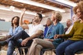 Man Asking Question At Neighborhood Meeting In Community Center Royalty Free Stock Photo