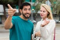 Man is asking woman stranger about road to hotel Royalty Free Stock Photo