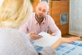 Man asks woman to sign document