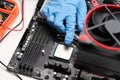 Man assembles components to build computer closeup