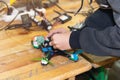 A man assembles and configures a high-speed drone Royalty Free Stock Photo