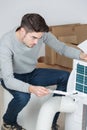 Man assembling air conditioning unit Royalty Free Stock Photo
