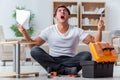 The man assembling furniture at home Royalty Free Stock Photo