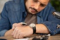 man assembling mechanical watch Royalty Free Stock Photo