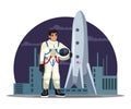 Man astronaut standing near spaceship shuttle