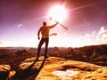 Man athlete runner with trekking poles running rocky trail Royalty Free Stock Photo