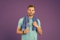 Man athletic hold water bottle. Handsome athlete drink water. Water balance. Sport for better life. Thirsty man. Athlete Royalty Free Stock Photo