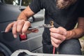 Man attaching a cable lug to a copper cable Royalty Free Stock Photo