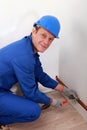 Man attaching copper pipe Royalty Free Stock Photo