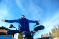 Man on the ATV Quad Bike on the mountains road. Royalty Free Stock Photo