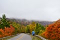 Man hiking in the mountains on autumn day. Royalty Free Stock Photo