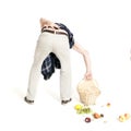 Man with back pain dropped fruit basket Royalty Free Stock Photo