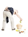 Man with back pain dropped fruit basket Royalty Free Stock Photo