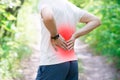 Man with back pain, injury while running, trauma during workout Royalty Free Stock Photo