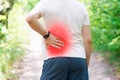 Man with back pain, kidney inflammation, trauma during workout Royalty Free Stock Photo