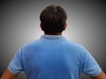 Man back side view on grey background Royalty Free Stock Photo