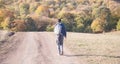 Man with a backpack going to forest Royalty Free Stock Photo