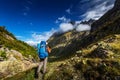 Man with backpack hiking in Caucasus mountains in Georgia Royalty Free Stock Photo