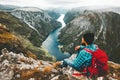 Man with backpack relaxing on mountain summit Royalty Free Stock Photo