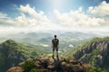 Man with backpack standing on the edge of cliff and looking at the valley, Male tourist standing on top of a mountain and enjoying Royalty Free Stock Photo