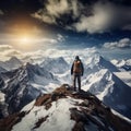 man with backpack standing on mountain peak Royalty Free Stock Photo