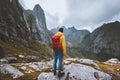 Man backpacker enjoying mountains landscape travel hike alone in Norway outdoor Royalty Free Stock Photo