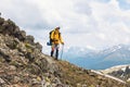 Man backpacker hiking on high mountains alone outdoor active lifestyle travel Royalty Free Stock Photo