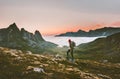 Man backpacker hiking in mountains alone outdoor Royalty Free Stock Photo
