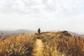 Man backpacker hiking in yellow mountains alone outdoor active lifestyle travel adventure vacations Georgia landscape alone into Royalty Free Stock Photo