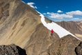 Man backpacker mountaineer standing mountain snow ridge peak, Bolivia