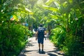 Man backpacker visiting Asia during a sunny day , Solo trip and vacations concept .