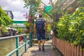 Man backpacker visiting Asia during a sunny day , Solo trip and vacations concept .