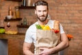 Man with bag full of food