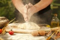 Man baker hands,pizza kneads dough and making housework making bread, butter, tomato flour