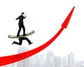 Man balancing running money legs on red arrow up Royalty Free Stock Photo