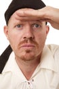 Man bandana hand on brow looking Royalty Free Stock Photo