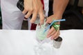 Man bartender prepares a cocktail in the bar