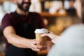 Man or bartender serving customer at coffee shop Royalty Free Stock Photo