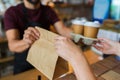 Man or bartender serving customer at coffee shop Royalty Free Stock Photo