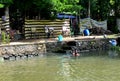 A man bathing in the freshwater of the back waters